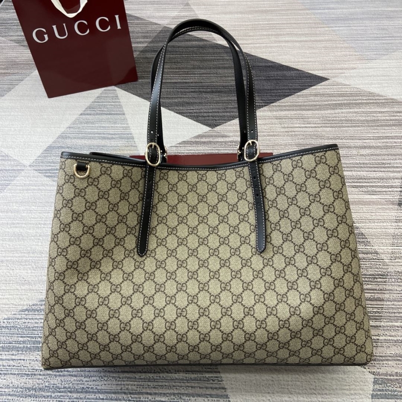 G*u*i shopping bags